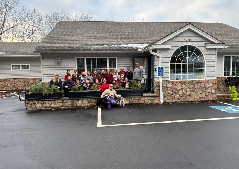 Carousel Slide 2: Central Animal Hospital Staff in front of entrance 2024